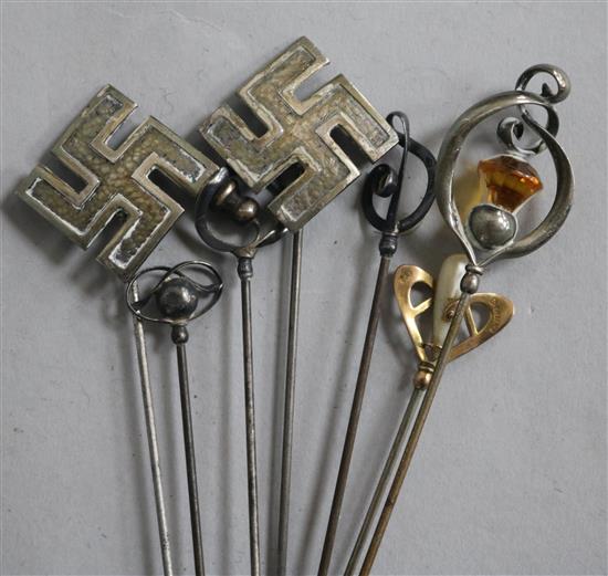 Seven assorted Charles Horner hatpins including one 9ct gold.